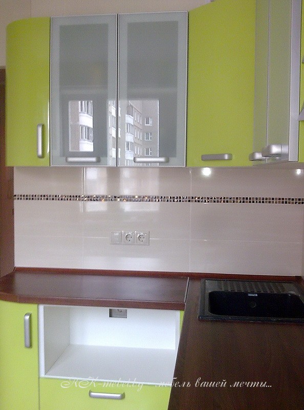 Угловая кухня с радиусными фасадами фото №2